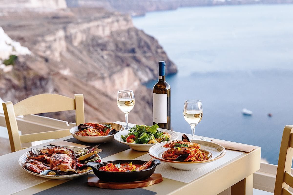 Golden Beaches and Iconic Blue-and-White Houses